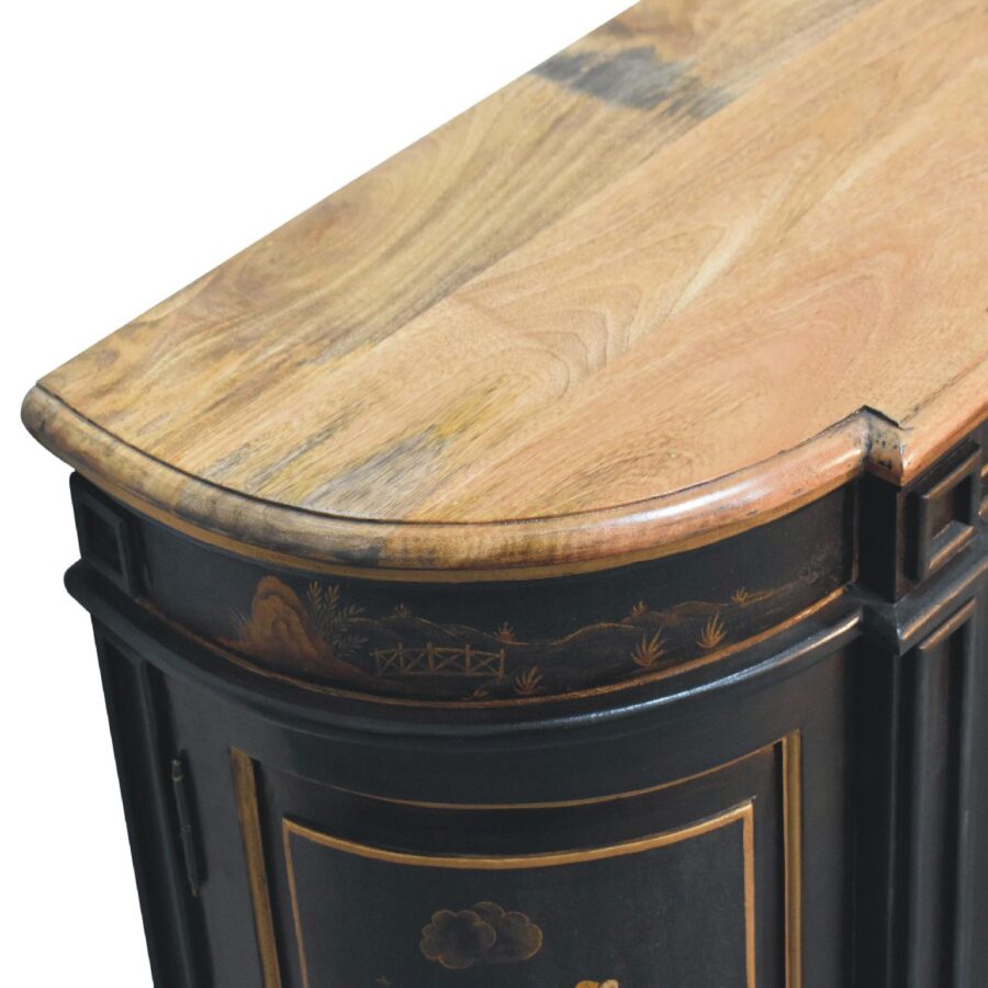 Antique wooden corner cabinet with ornate detailing.