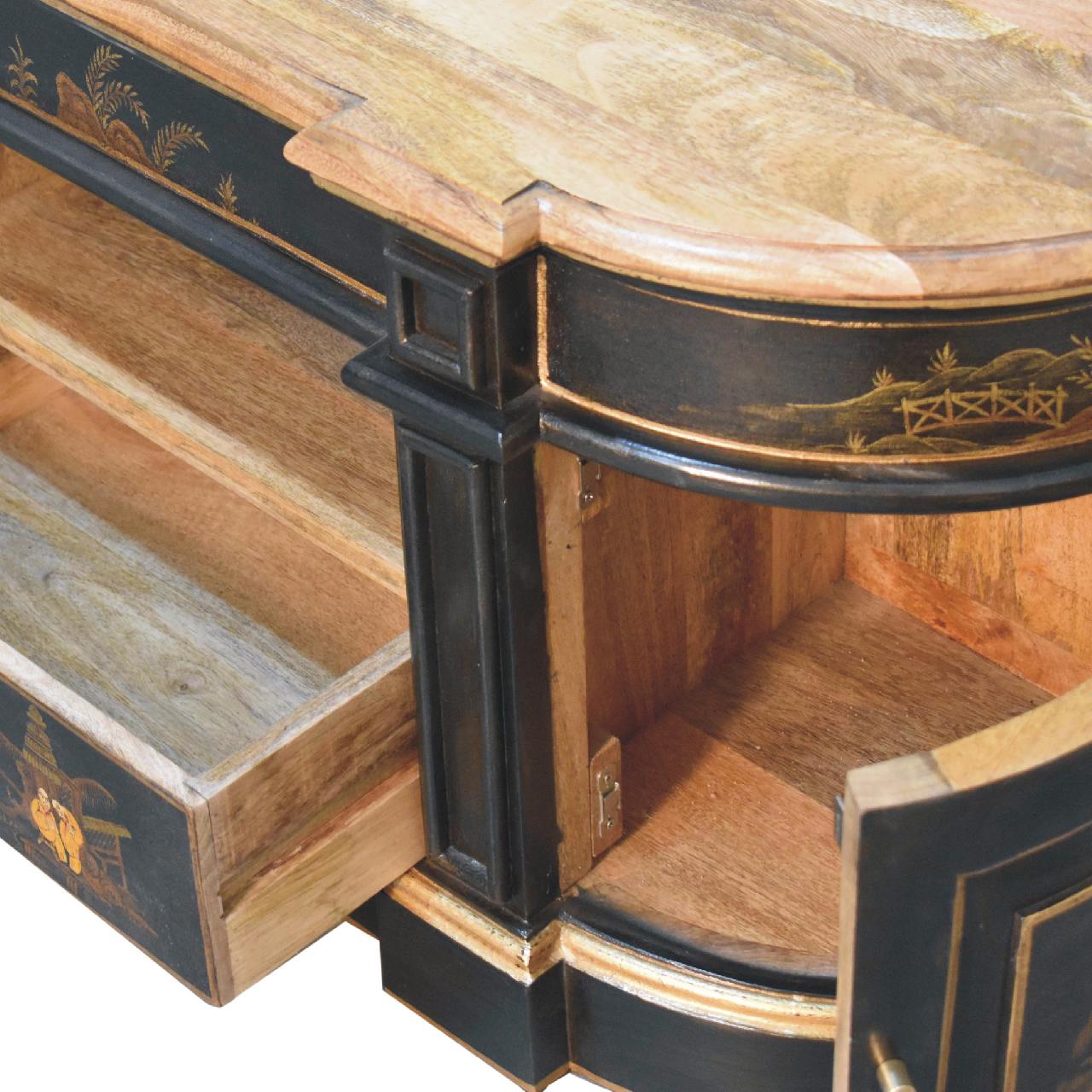 Antique wooden desk with open drawer detail.