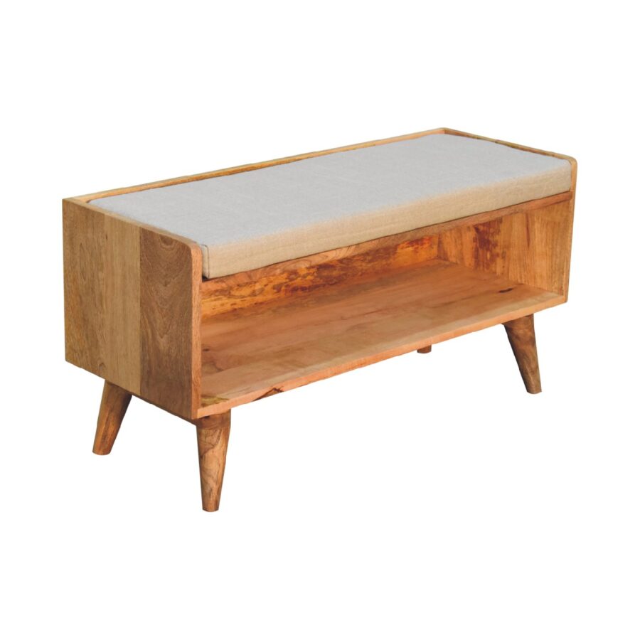 Wooden bench with cushion and lower shelf, isolated on white.