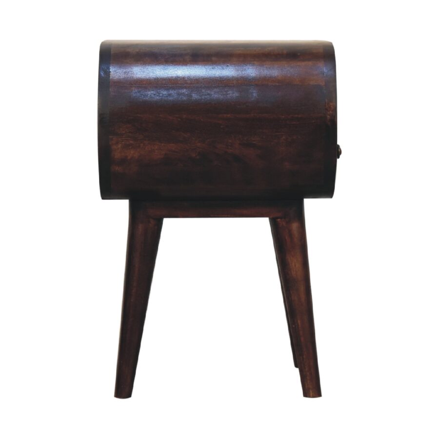 Wooden drum on tripod stand.