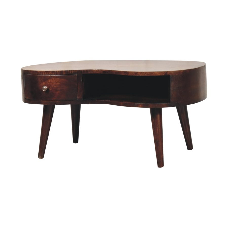 Vintage wooden coffee table with drawer on white background.