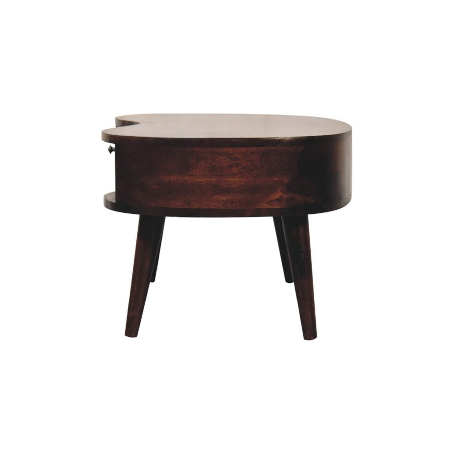 Vintage round wooden side table on white background.
